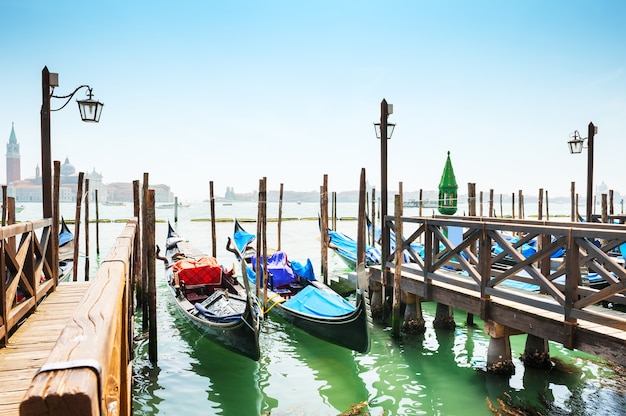 Gondolas on Grand canal in Venice, Italy. Beautiful summer landscape