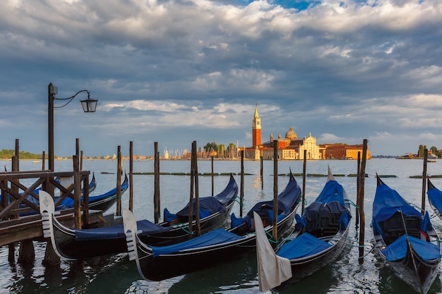 Gondolas in Venice lagoon after the storm Italia