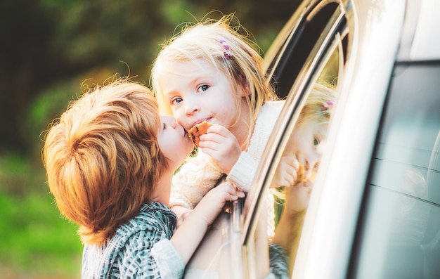 Good bye before car travel cute children saying goodbye before car travel