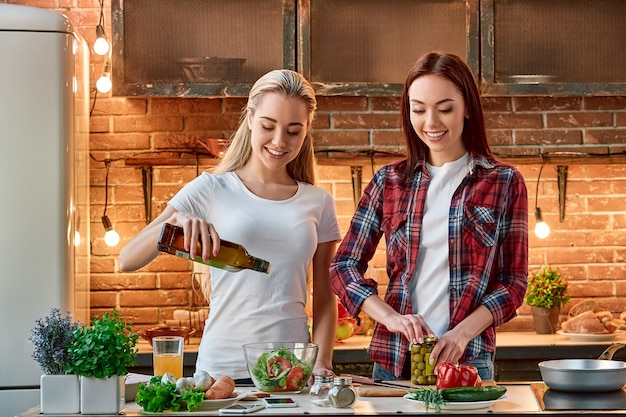 Good food is all the sweeter when shared with good friends young female friends preparing