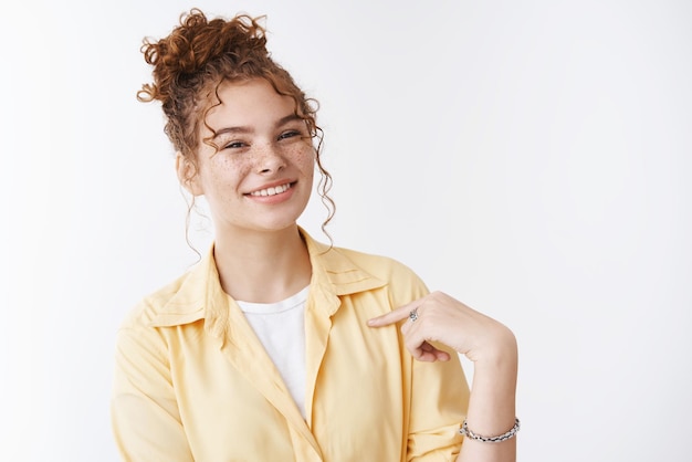 good-looking   girl pointing herself smiling delighted