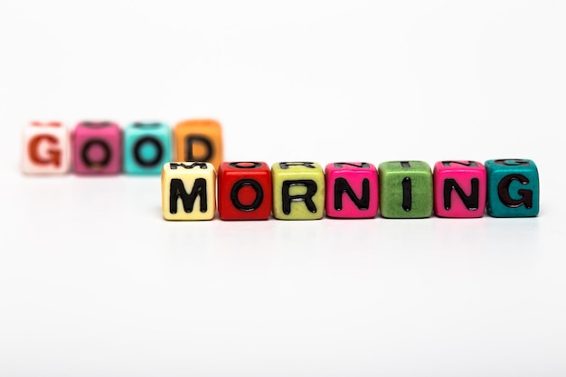 Good morning word made from multicolored child toy cubes with lettersxA