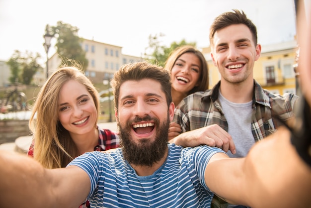 Good people take a selfie on the street.