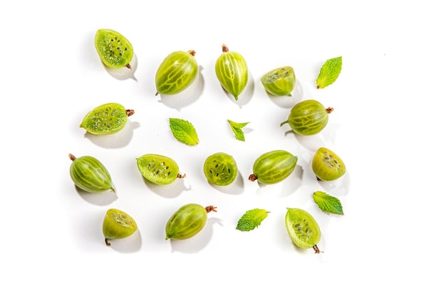 Gooseberry with leaf isolated on white