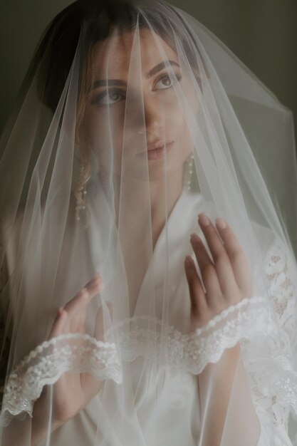 Gorgeous bride in a beautiful dress. Morning newlyweds.