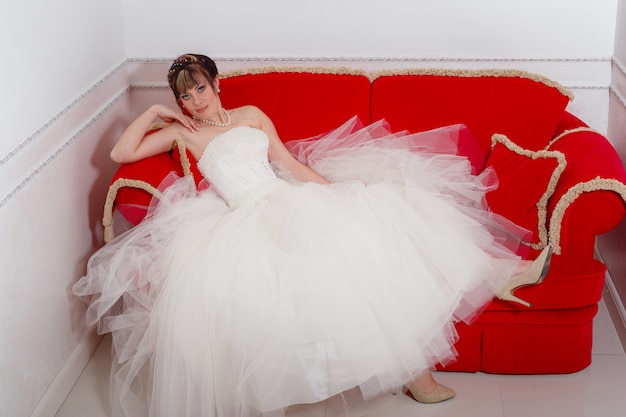 Gorgeous bride portrait with make-up in the morning in room.