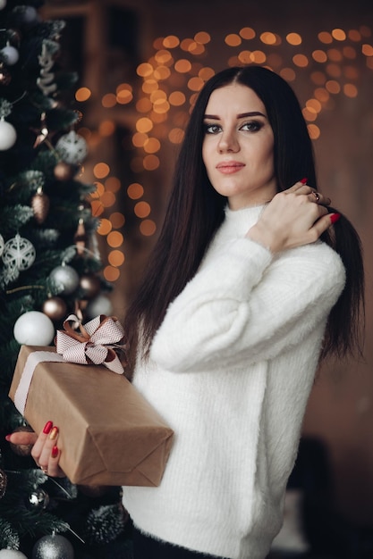 Gorgeous girl with long dark hair with little white dwarf