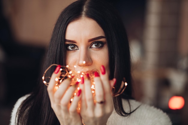 Gorgeous girl with long dark hair with little white dwarf