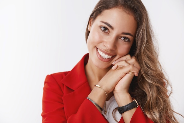 Gorgeous  stylish successful modern businesswoman in red trendy jacket smiling