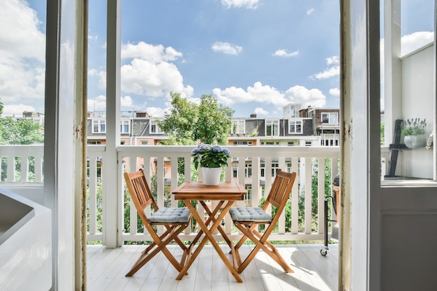 Gorgeous view of the street from balcony with a tea table