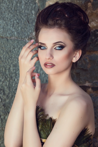 Gorgeous Woman in Evening retro dress Posing near old palace.