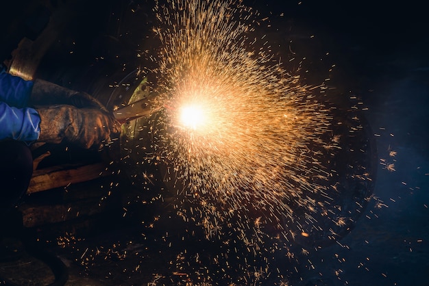 Gouging welding steel structure and bright sparks in steel construction industry