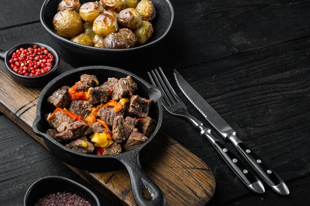 Goulash, beef stew set, in cast iron frying pan