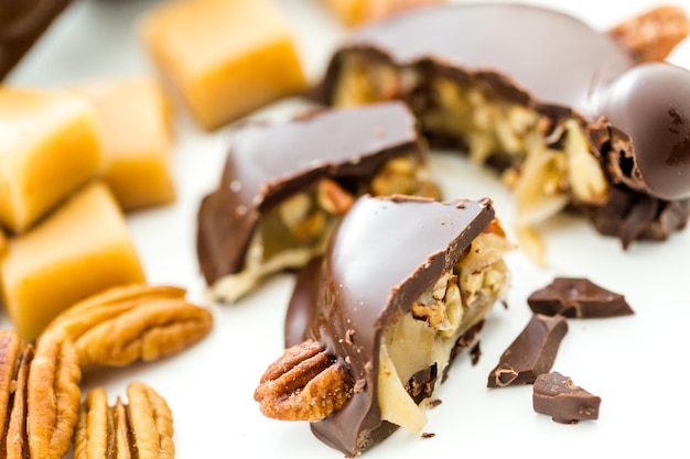 Gourmet Caramel Pecan Turtles made with milk chocolate and whole pecans.