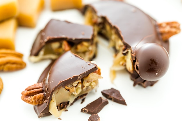 Gourmet Caramel Pecan Turtles made with milk chocolate and whole pecans.