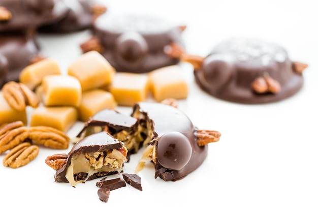 Gourmet Caramel Pecan Turtles made with milk chocolate and whole pecans.