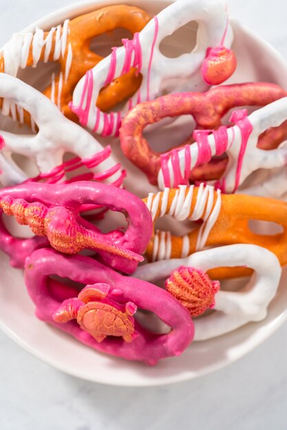 Gourmet chocolatecovered pretzel twists with seashellshaped chocolates