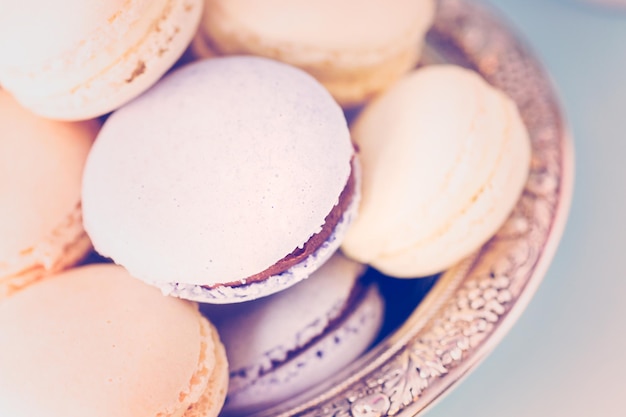 Gourmet Spring macarons on silver platter.