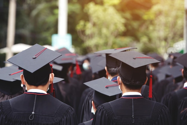 Graduates receive a certificate at the university