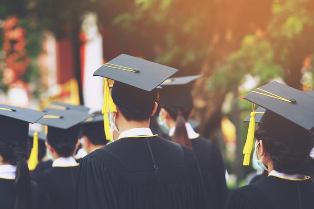 Graduates wear masks to prevent the spread of COVID-19