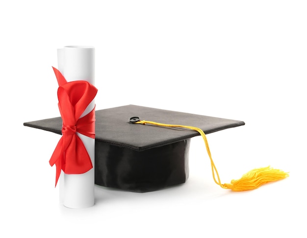 Graduation hat and diploma on white background