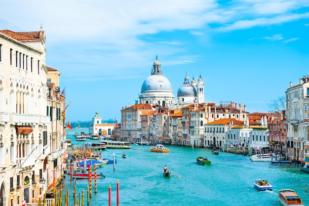 Grand Canal and Basilica Santa Maria della Salute in Venice, Italy. Famous tourist destination. Travel and vacation concept