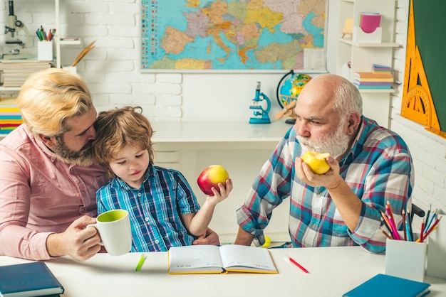 Grandfather father and grandson boy men generation three different generations ages grandfather fath