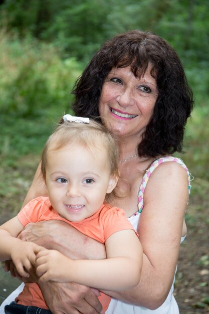 Grandmother and granddaughter love in the park