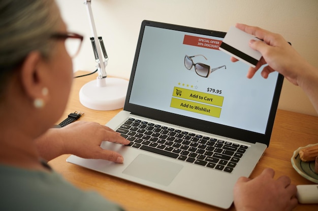 Grandmother and Grandson Shopping Online