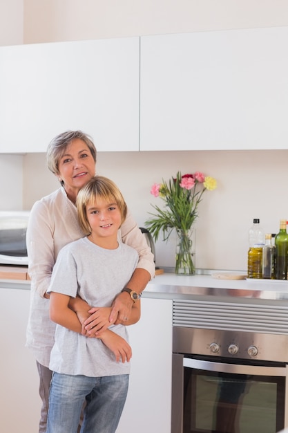 Grandmother hugging her grandson 