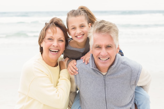 Grandparents with their granddaughter