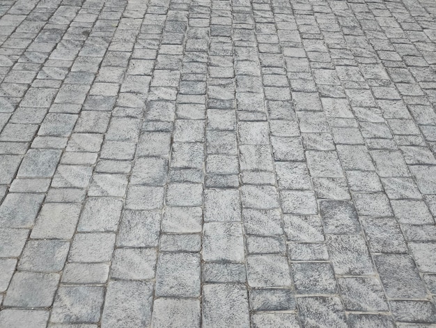 Granite cobblestone background Paving stone texture Pavement