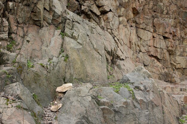 Granite rocks with faults Destruction of granite wall