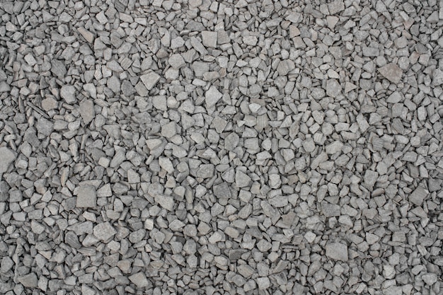 Granite stone crushed construction gravel texture. Pattern background.