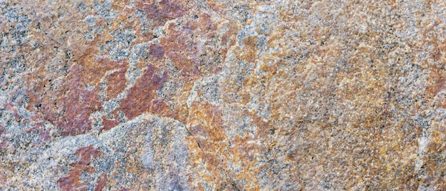 Granite texture Granite rocks with porous surface Background from solid stone