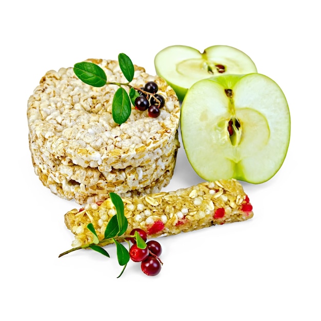 Granola bar and bread with lingonberries and apples