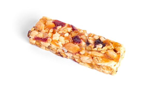 Granola bar with nuts and dried fruits isolated on a white background. High quality photo