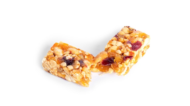 Granola bar with nuts and dried fruits isolated on a white background. High quality photo