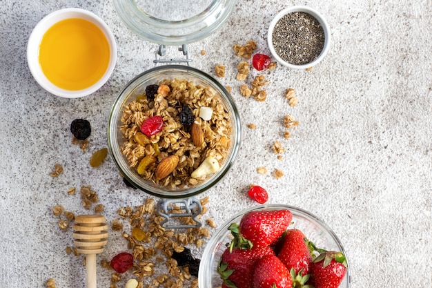 Granola with dry fruits, nuts and honey. Healthy breakfast set. 