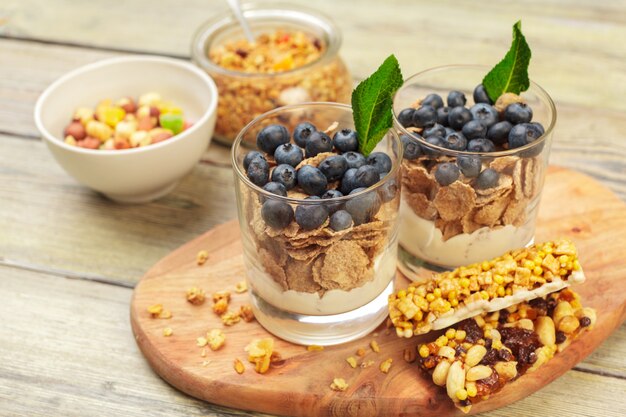 Granola, yogurt and strawberries in a jars