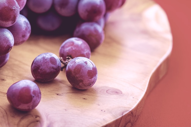 grape fruit food photo of grapes on a wooden board macro photography