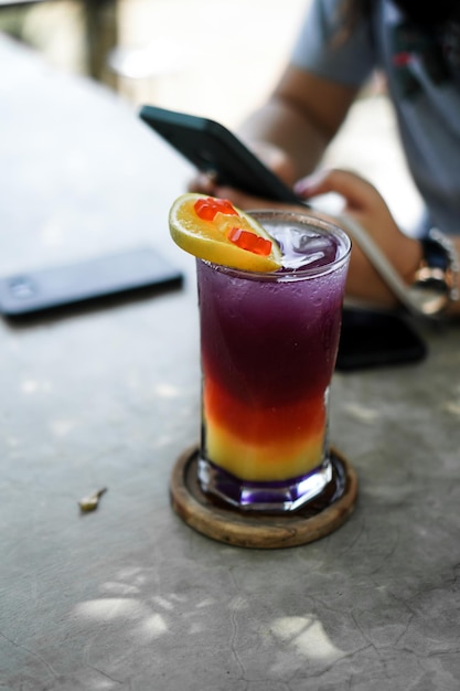 Grape and Orange Mocktail with Jelly candy Beverages Background