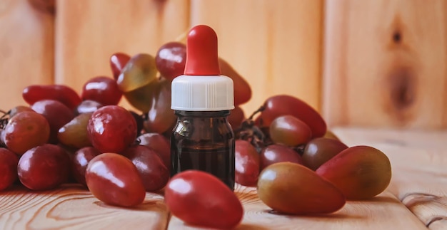 Grape seed oil extract in small bottles selective focus