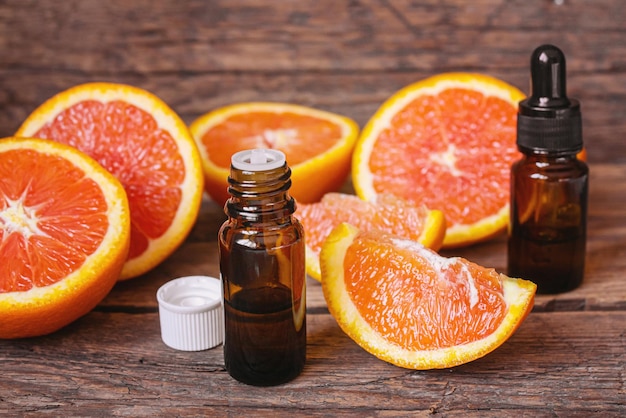 Grapefruit essential oil in a small bottle Selective focus