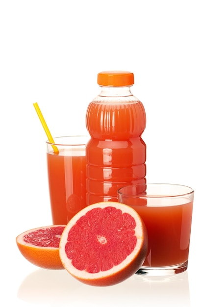 Grapefruit juice in plastic bottle and grapefruit fruits on white background