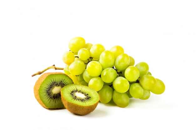 Grapes and kiwi on white