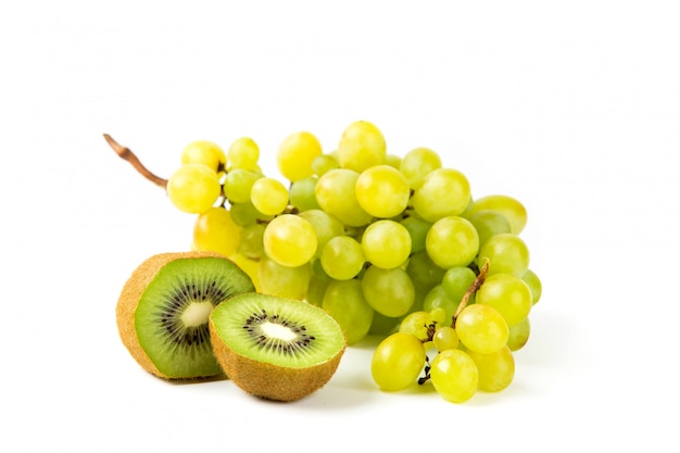 Grapes and kiwi on white