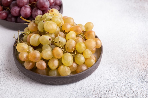 Grapes on a light background Fresh fruit Dieting and healthy eating Copy space