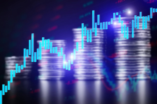 Graph of a growing stock market on the background of stacks of coins