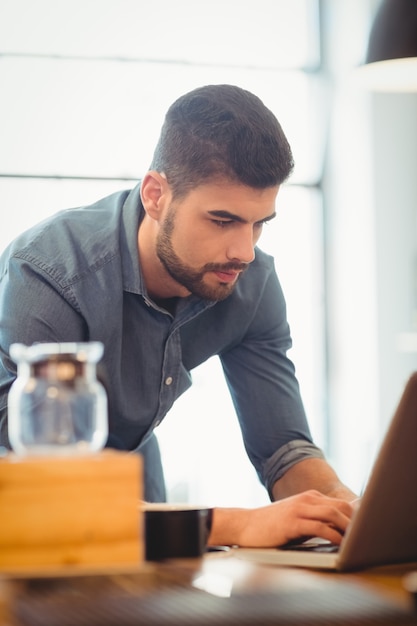 Graphic designer working on laptop